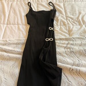 Black Mach & Mach knit cut out mini dress in black. Size 36 ( US 4)